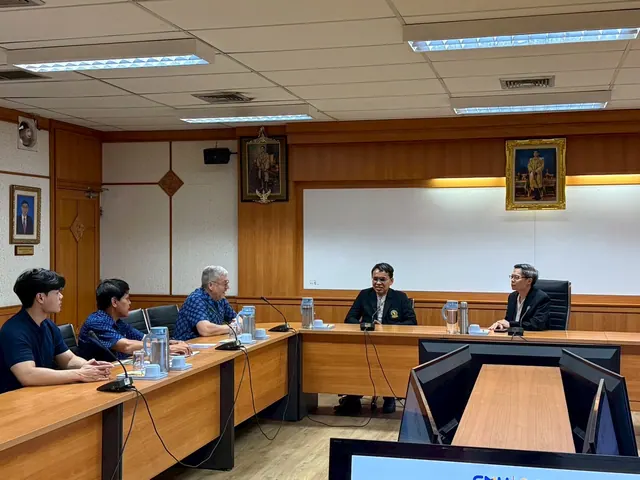 Photo 3: Prof. Dr. Vasile Berinde Meets the Dean of the Faculty of Science